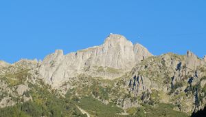 Preview wallpaper rock, mountain, slope, trees, relief, landscape