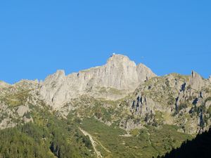 Preview wallpaper rock, mountain, slope, trees, relief, landscape