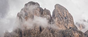 Preview wallpaper rock, mountain, slope, fog, trees, landscape