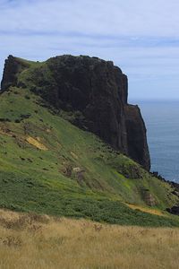 Preview wallpaper rock, mountain, slope, cliff, grass