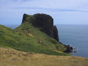 Preview wallpaper rock, mountain, slope, cliff, grass