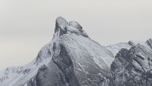 Preview wallpaper rock, mountain, snow, peak, relief, nature