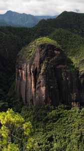 Preview wallpaper rock, mountains, grass, trees