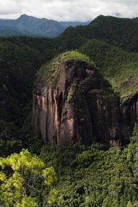 Preview wallpaper rock, mountains, grass, trees