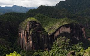 Preview wallpaper rock, mountains, grass, trees