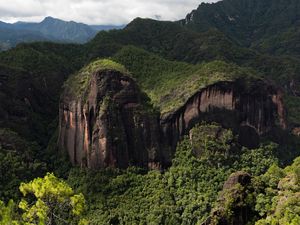 Preview wallpaper rock, mountains, grass, trees