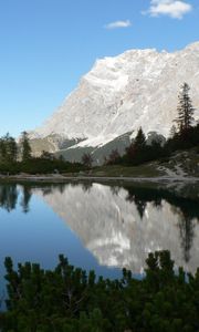 Preview wallpaper rock, mountains, lake, reflection, mirror, shade, trees