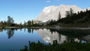 Preview wallpaper rock, mountains, lake, reflection, mirror, shade, trees