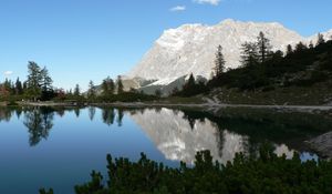 Preview wallpaper rock, mountains, lake, reflection, mirror, shade, trees