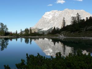 Preview wallpaper rock, mountains, lake, reflection, mirror, shade, trees