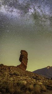 Preview wallpaper rock, mountains, night, stars, landscape