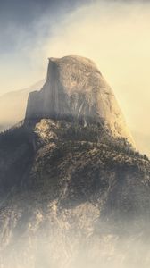 Preview wallpaper rock, mountains, peak, fog, nature