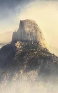 Preview wallpaper rock, mountains, peak, fog, nature