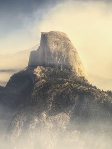 Preview wallpaper rock, mountains, peak, fog, nature