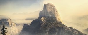 Preview wallpaper rock, mountains, peak, fog, nature