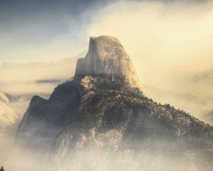 Preview wallpaper rock, mountains, peak, fog, nature