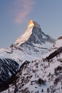 Preview wallpaper rock, mountains, peak, snow, snowy, slope