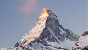 Preview wallpaper rock, mountains, peak, snow, snowy, slope