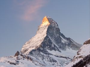 Preview wallpaper rock, mountains, peak, snow, snowy, slope