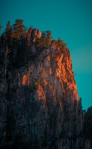 Preview wallpaper rock, mountains, peak, trees, sky