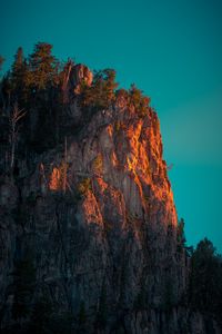 Preview wallpaper rock, mountains, peak, trees, sky