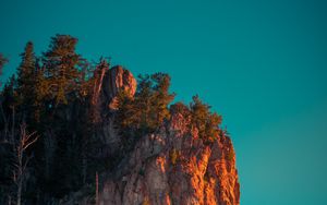 Preview wallpaper rock, mountains, peak, trees, sky