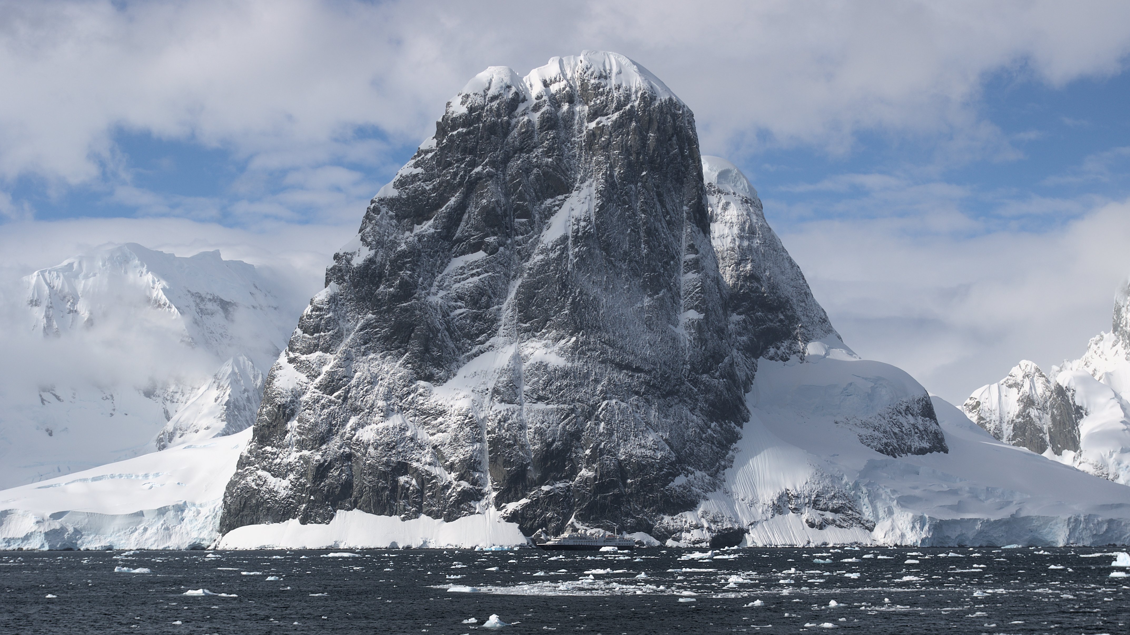 Snowy Rocks Background Download wallpaper 4291x2413 rock, mountains, snow, nature hd background