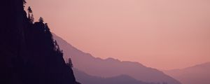 Preview wallpaper rock, mountains, trees, evening, cliff