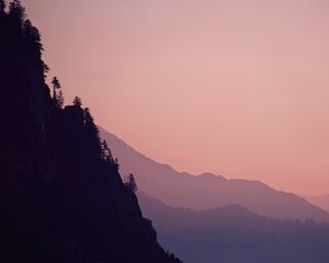 Preview wallpaper rock, mountains, trees, evening, cliff