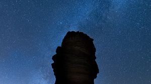 Preview wallpaper rock, night, starry sky, dark, darkness