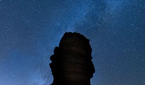 Preview wallpaper rock, night, starry sky, dark, darkness