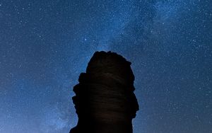 Preview wallpaper rock, night, starry sky, dark, darkness