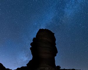 Preview wallpaper rock, night, starry sky, dark, darkness