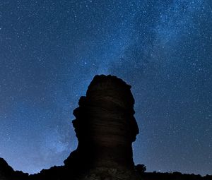 Preview wallpaper rock, night, starry sky, dark, darkness