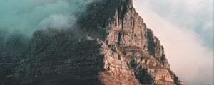 Preview wallpaper rock, peak, cloud, fog