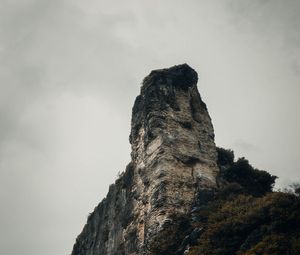 Preview wallpaper rock, peak, mountain, trees, nature