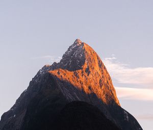 Preview wallpaper rock, peak, mountains, snow, snowy, sky