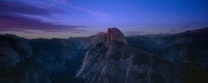 Preview wallpaper rock, peak, mountains, sunset, clouds