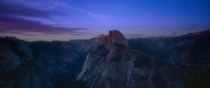 Preview wallpaper rock, peak, mountains, sunset, clouds