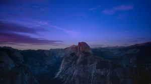 Preview wallpaper rock, peak, mountains, sunset, clouds