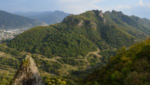 Preview wallpaper rock, peak, valley, hills, view, nature