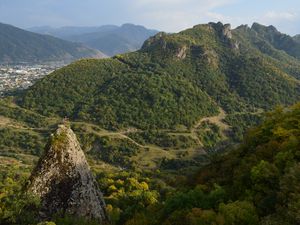 Preview wallpaper rock, peak, valley, hills, view, nature