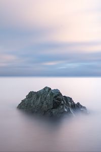 Preview wallpaper rock, relief, clouds, horizon