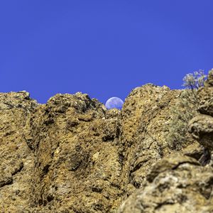 Preview wallpaper rock, relief, moon, sky