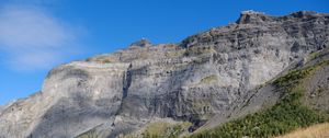 Preview wallpaper rock, relief, slope, grass, landscape