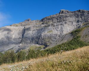 Preview wallpaper rock, relief, slope, grass, landscape