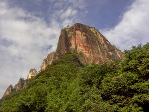 Preview wallpaper rock, relief, trees, nature, sky