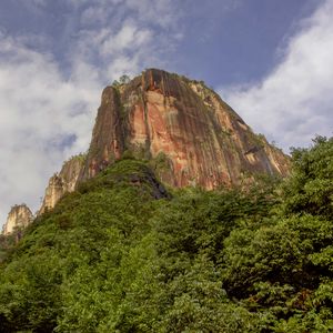 Preview wallpaper rock, relief, trees, nature, sky