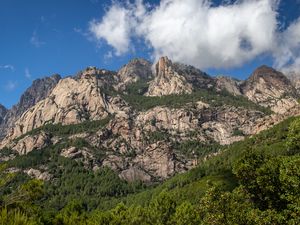 Preview wallpaper rock, relief, trees, clouds, nature