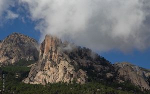 Preview wallpaper rock, relief, trees, clouds, view